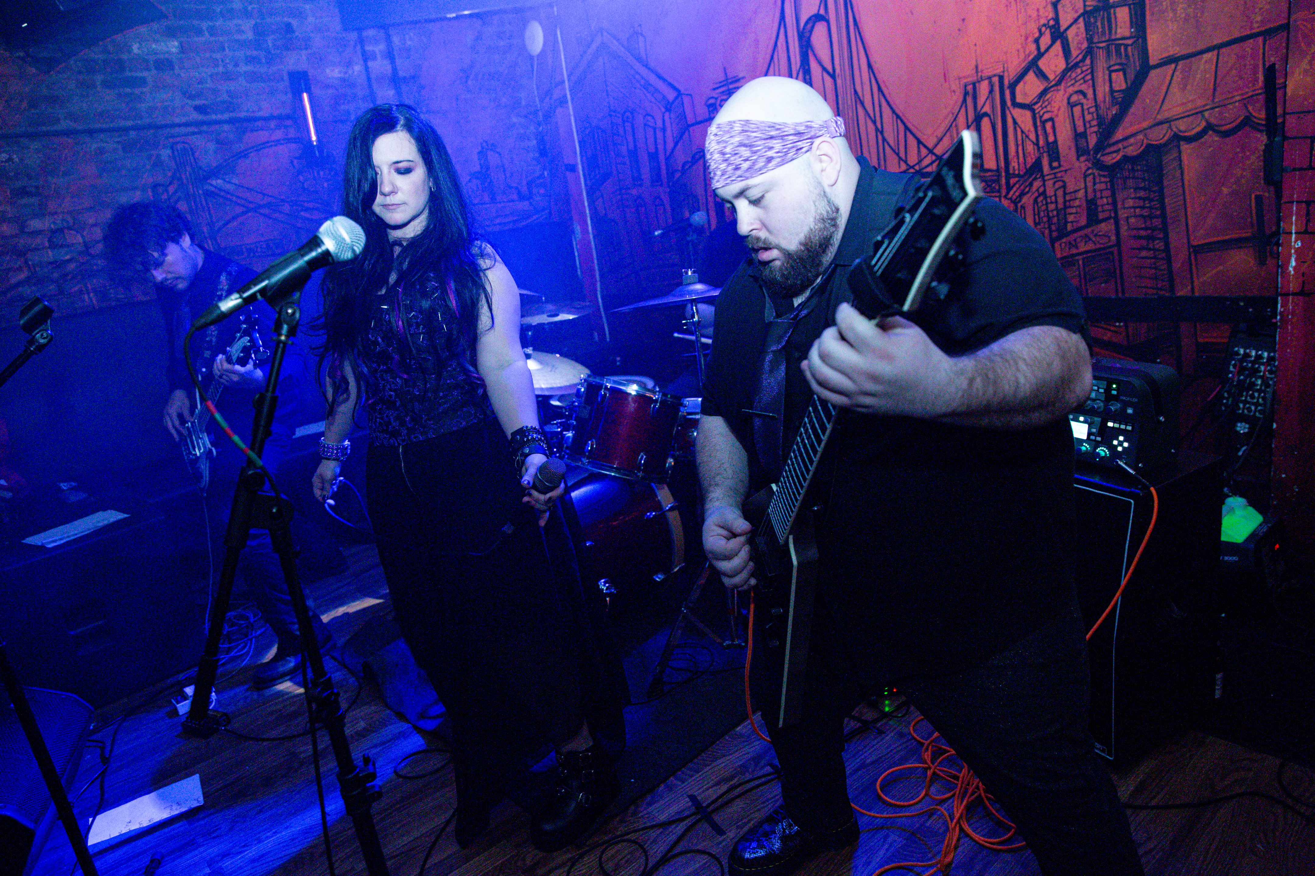 Surrender in Silence live, blue and red stage light